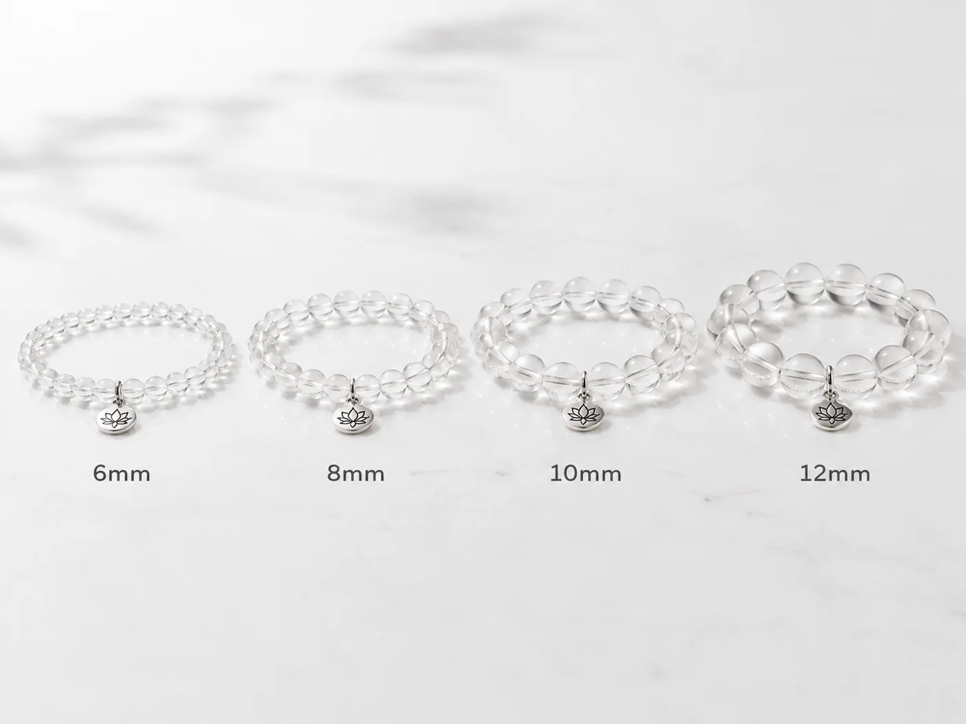 Crystal bracelet bead size comparison showing 6mm, 8mm, 10mm and 12mm beads